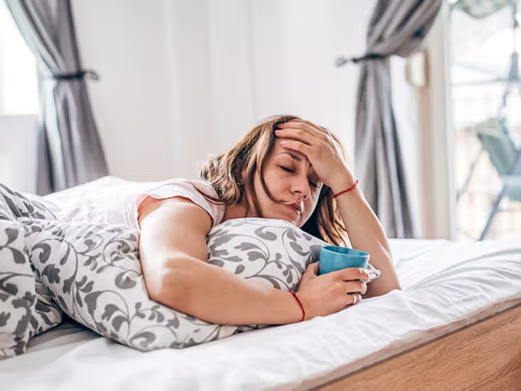 Woman feeling anxious and stressed during the luteal phase of her menstrual cycle