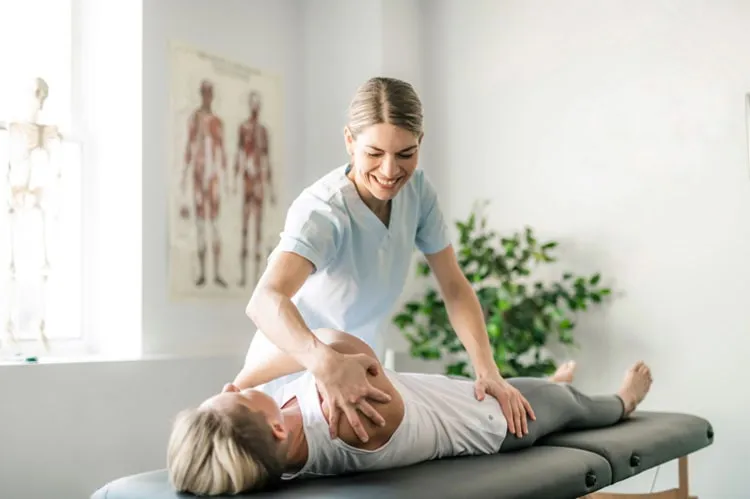 Physiotherapy for back pain treatment session